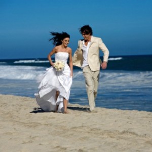 Honeymoon couple on beach 300x300 