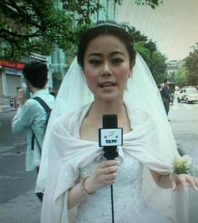 o REPORTER CHINA EARTHQUAKE WEDDING DRESS 5701 Prekinula sopstveno venčanje i izveštavala o zemljotresu 